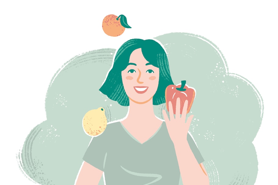 Frau jongliert Obst und Gemüse